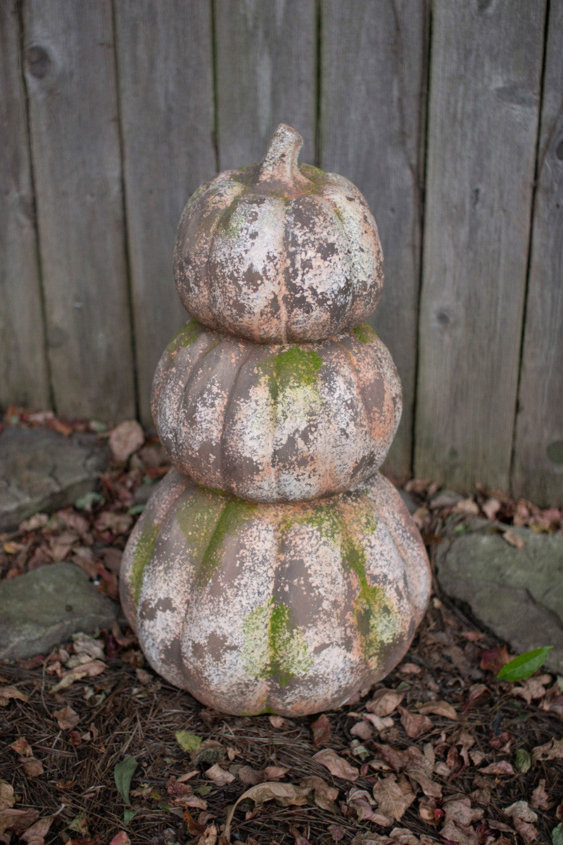 There Stacked Concrete Pumpkins